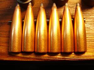 Click image for larger version. 

Name:	50BMG dies & bullets 002.jpg 
Views:	35 
Size:	83.1 KB 
ID:	128753