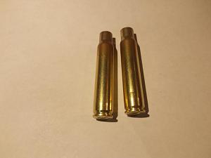 My old 1894 now uses .30-30 brass necked up to .35 cal.