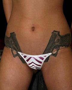Click image for larger version. 

Name:	bikini_girl_with_gun_tattoos.jpg 
Views:	46 
Size:	25.5 KB 
ID:	66549
