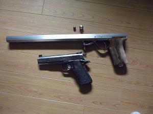 Click image for larger version. 

Name:	under hammer pistol and 1911.jpg 
Views:	23 
Size:	51.3 KB 
ID:	285251