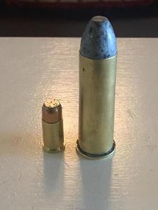 Click image for larger version. 

Name:	32 smith compared to 50 caliber.jpg 
Views:	32 
Size:	23.0 KB 
ID:	221278